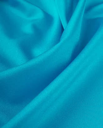 Купить Одежные ткани голубого цвета 30 метров Бифлекс Глянцевый арт. ТБФ-7-15-21049.034 оптом в Казахстане