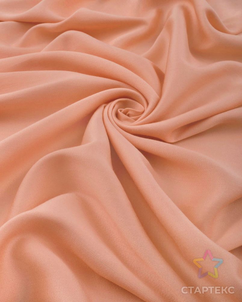 Вискоза оптом. Штапель сатин. Ткань абрикосового цвета. Персиковый цвет ткани. Штапель-сатин однотонный.